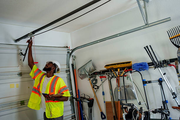 Professional Garage Door Panel Replacement technician working in Hoosick Falls, NY